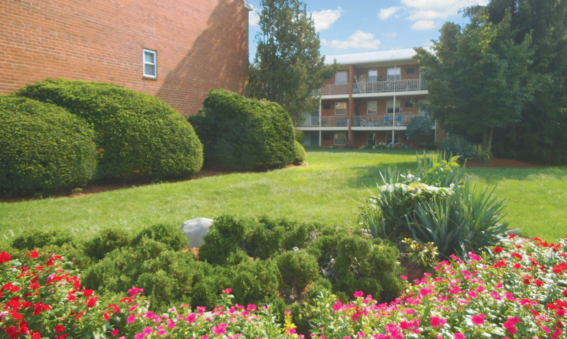 Colonial Point https://www.colonialpointbensalem.com/wp-content/uploads/sites/1002/2013/08/landscaping-with-flowers-and-trees-home1.jpg